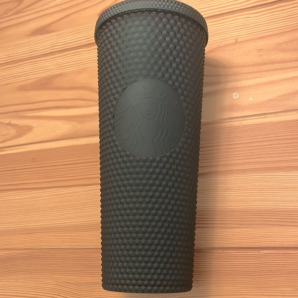 Green studded Starbucks tumbler